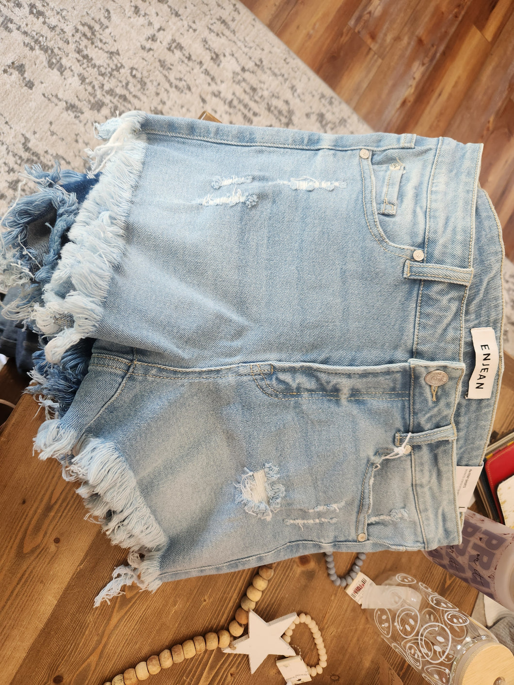 Enjean mid rise destructed fray shorts