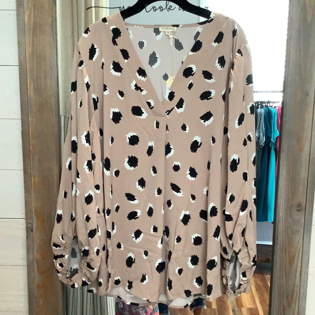 Beige with black and white spots